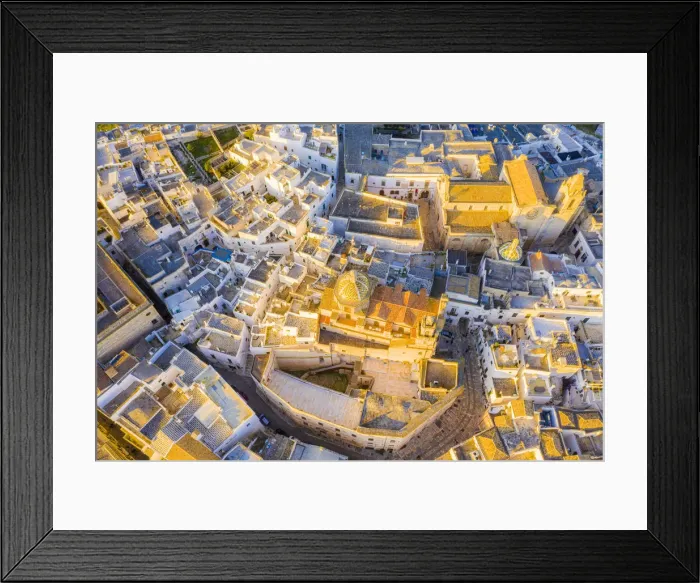 Framed Print : Zenithal aerial view of the old town of Ostuni at sunset, Apulia, Italy, Europe Framed Print : Zenithal aerial view of the old town of Ostuni at sunset, Apulia, Italy, Europe
