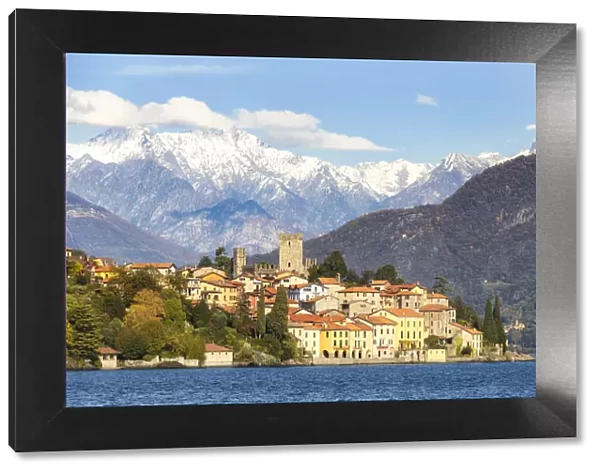 Village of Rezzonico with snowcapped mountains in the background, Lake Como, Lombardy