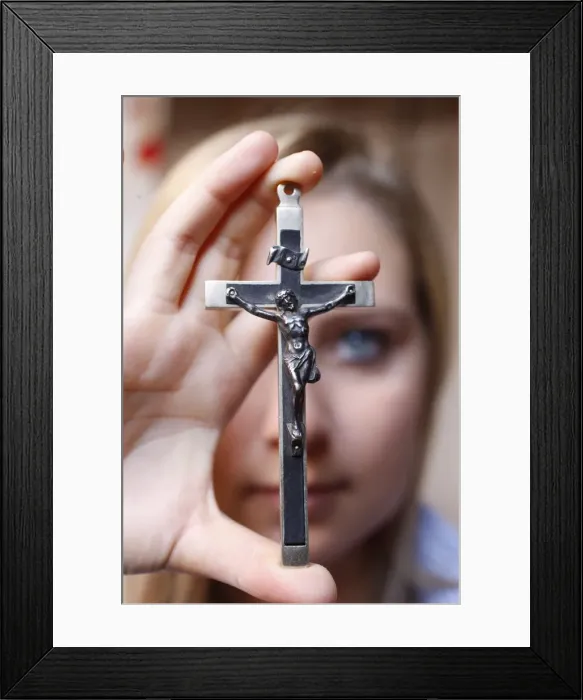 Framed Print : Teenage girl holding a crucifix, Saint Gervais, Haute Savoie, france, Europe Framed Print : Teenage girl holding a crucifix, Saint Gervais, Haute Savoie, france, Europe