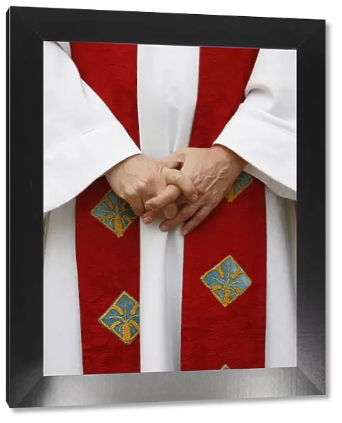 Catholic priest dressed for mass, Pontigny, Yonne, France, Europe
