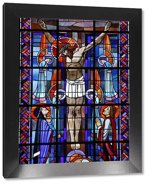 Stained glass of the Crucifixion in Notre Dame du Rosaire Catholic church, Saint-Ouen