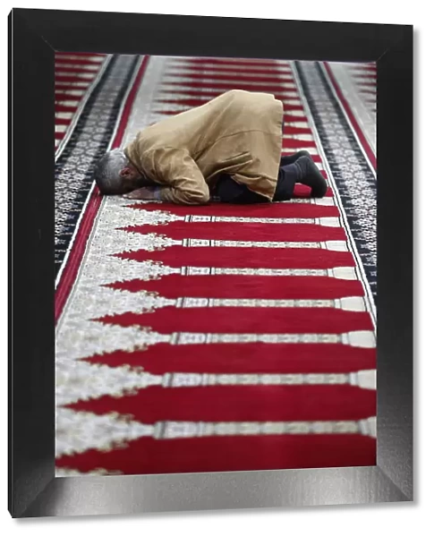 Muslim praying in Prayer Hall in Amman airport, Amman, Jordan, Middle East