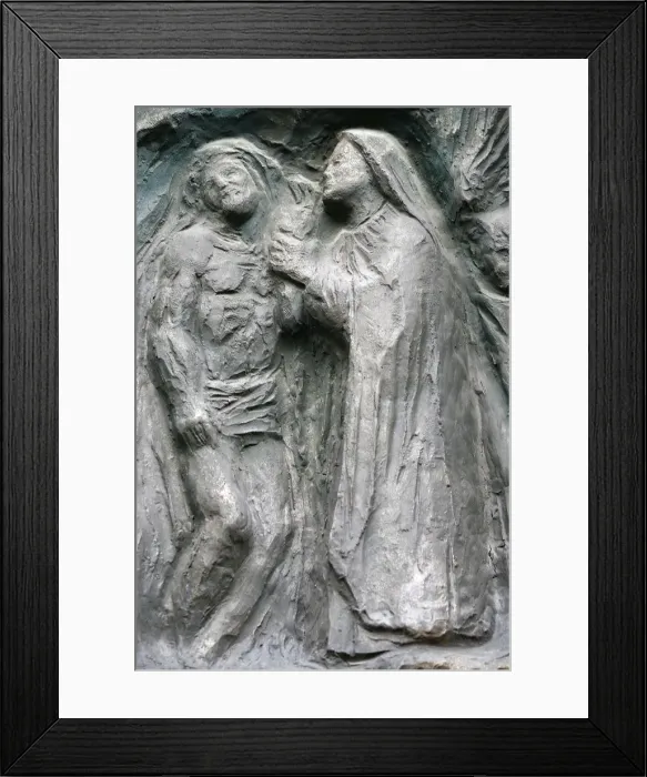 Framed Print : Sculpture of Jesus taken down from the cross, on the Notre Dame door