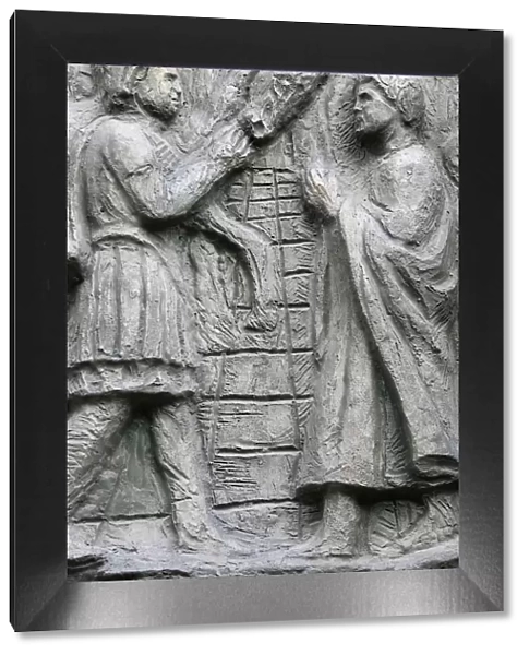 Sculpture depicting a Miracle on the Notre Dame door, Saint-Pierre de Montmartre church