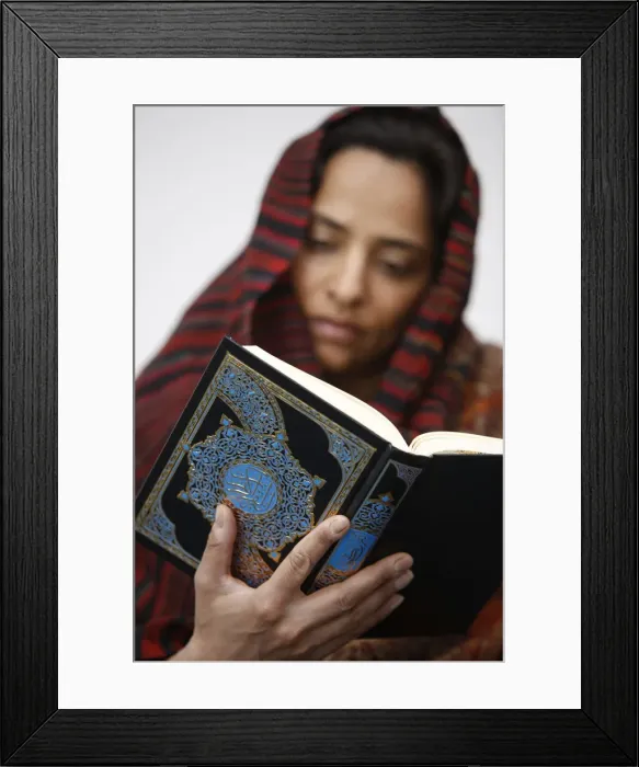 Framed Print : Woman reading Koran, Jordan, Middle East