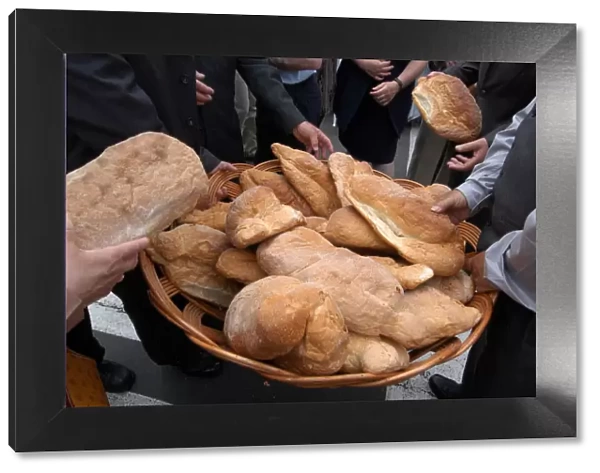 Bread distribution during Espiritu Santo Festival, Vila Nova, Azores, Portugal, Europe
