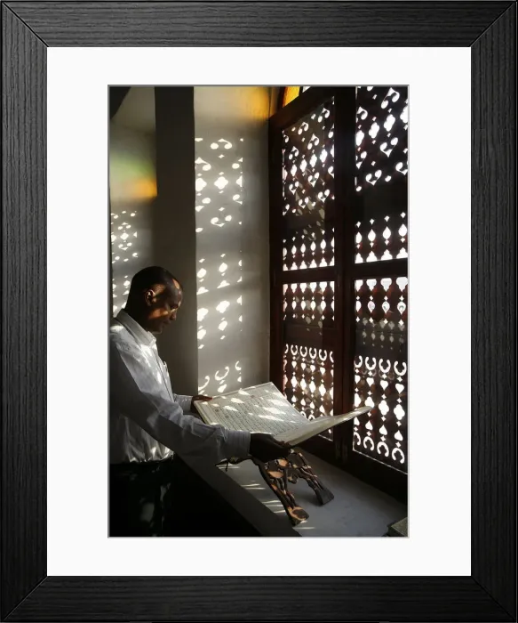 Framed Print : Man reading the Koran in a Doha mosque, Doha, Qatar, Middle East Framed Print : Man reading the Koran in a Doha mosque, Doha, Qatar, Middle East