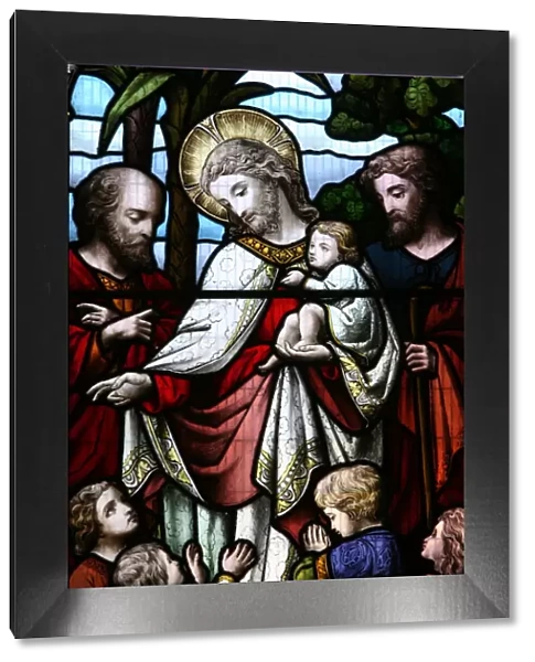 Stained glass window depicting Jesus welcoming children, Billingshurst, Sussex, England