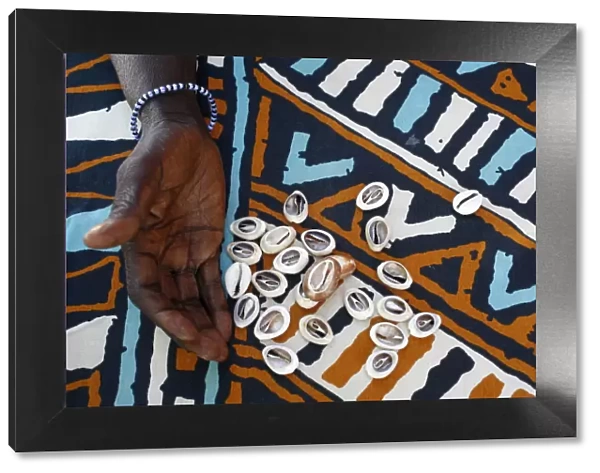 Fortune telling with cowrie shells, Saly, Thies, Senegal, West Africa, Africa
