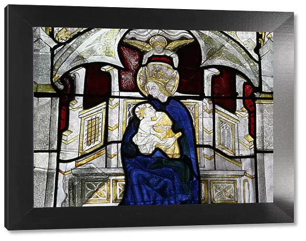 Stained glass window of the Virgin and Child at Collegiale Notre-Dame des Marais