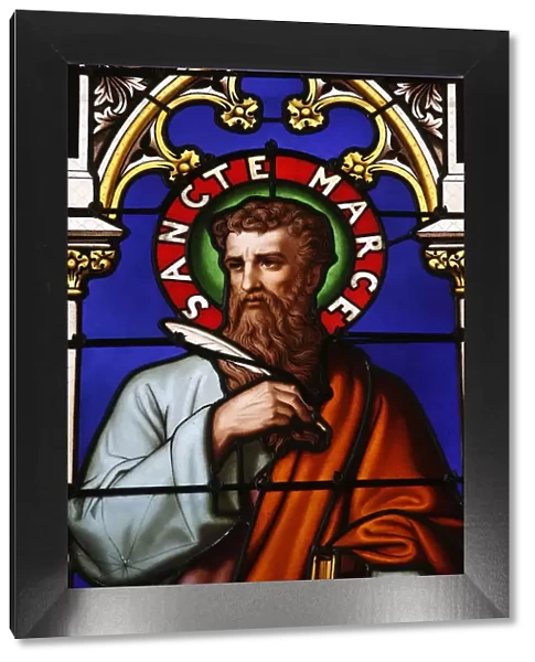 Stained glass window of St. Mark at Collegiale Notre-Dame des Marais