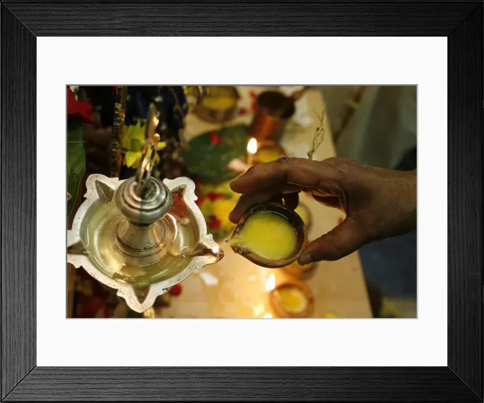 Framed Print : Oil lamp in a Sri Lankan temple, Paris, France, Europe Framed Print : Oil lamp in a Sri Lankan temple, Paris, France, Europe