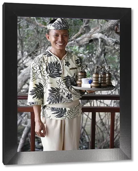 Indonesian waiter at the Banyan Tree hotel, Bintan, Indonesia, Southeast Asia, Asia