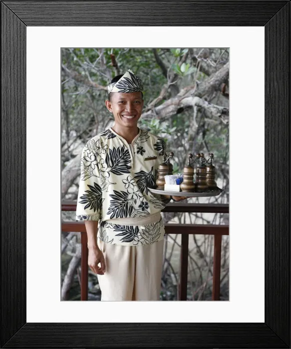 Framed Print : Indonesian waiter at the Banyan Tree hotel, Bintan, Indonesia, Southeast Asia, Asia