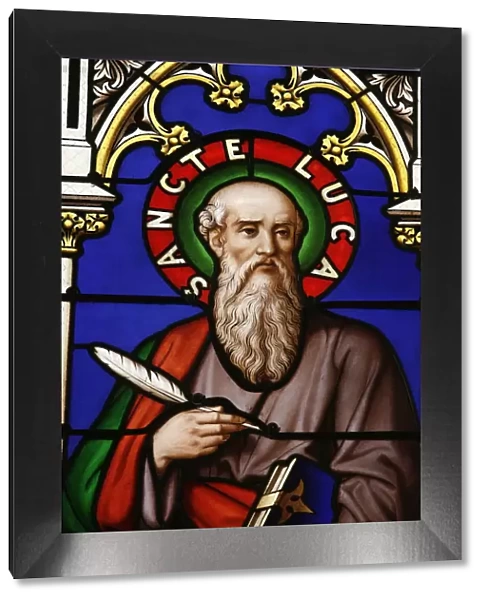 Stained glass window of St. Luke at Collegiale Notre-Dame des Marais