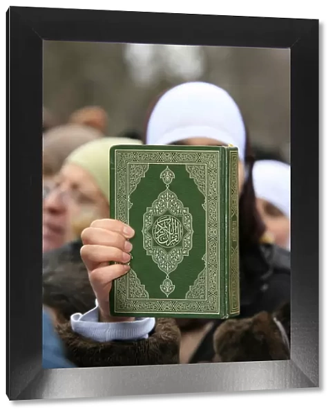 Koran being held during a Muslim demonstration, Paris, France, Europe