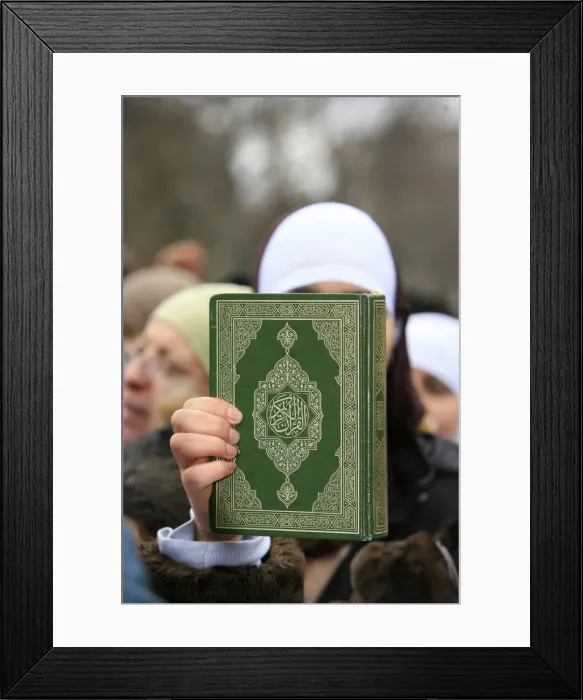 Framed Print : Koran being held during a Muslim demonstration, Paris, France, Europe Framed Print : Koran being held during a Muslim demonstration, Paris, France, Europe