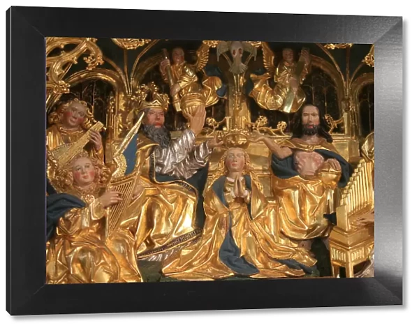 Golden oak retable showing Marys coronation, dating from the 16th century
