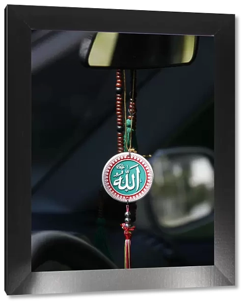 Muslim symbols in a car, Chatillon-sur-Chalaronne, Ain, France, Europe