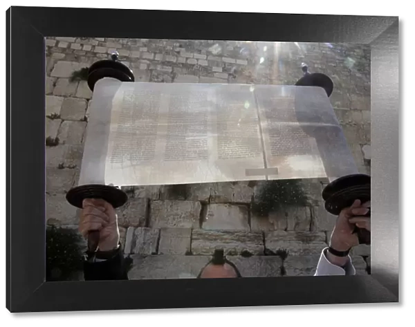 A ceremonial reading of the Torah from Torah scroll under the Western Wall, Jerusalem