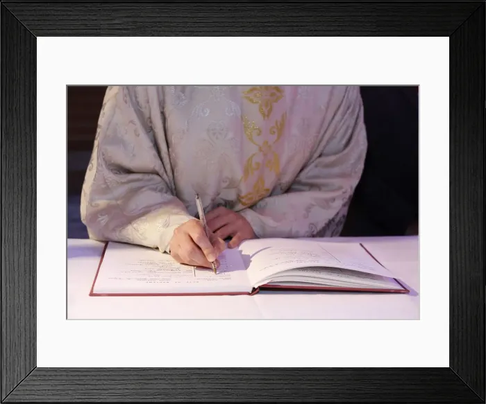 Framed Print : Signing the Baptism register, Mass of the sacraments at St Framed Print : Signing the Baptism register, Mass of the sacraments at St