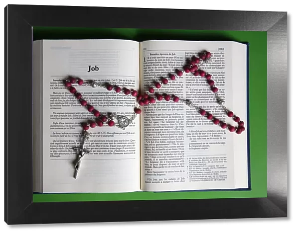 Prayer beads over an open Bible, Eure, France, Europe