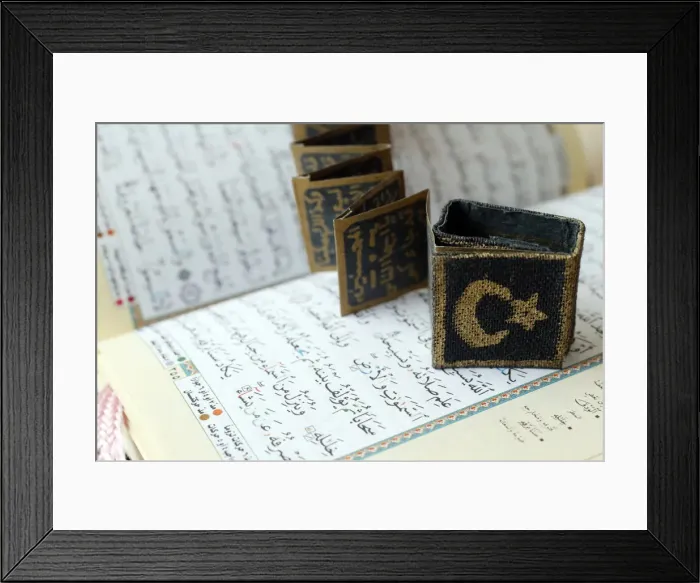 Framed Print : Close-up of Quran, crescent, star and surats, Muslim symbols, Vietnam, Indochina Framed Print : Close-up of Quran, crescent, star and surats, Muslim symbols, Vietnam, Indochina