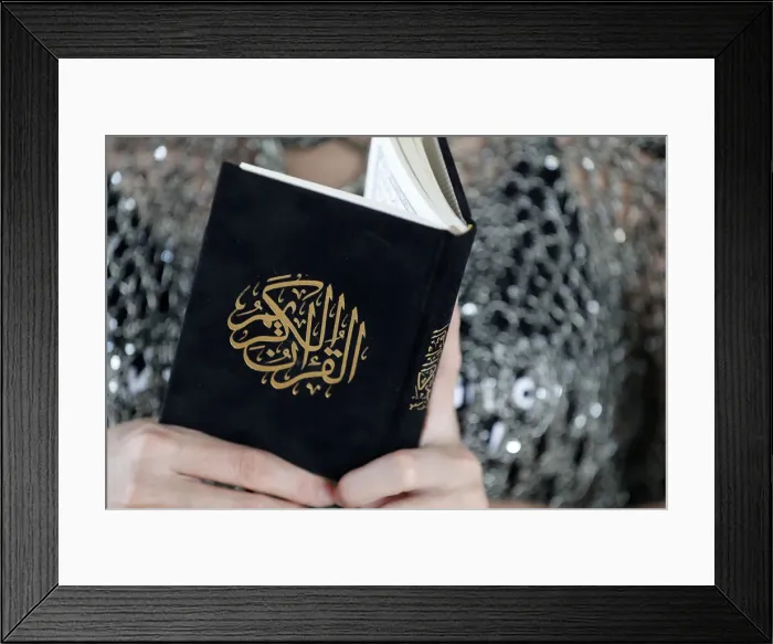 Framed Print : Close-up of woman reading the Noble Quran, Ho Chi Minh City, Vietnam, Indochina Framed Print : Close-up of woman reading the Noble Quran, Ho Chi Minh City, Vietnam, Indochina