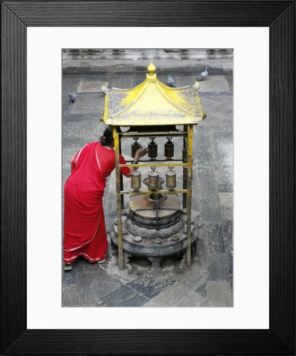 Framed Print : Woman and prayer wheels, Golden Temple, Patan, Nepal, Asia Framed Print : Woman and prayer wheels, Golden Temple, Patan, Nepal, Asia