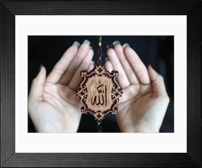 Framed Print : Close-up of the word Allah in Arabic calligraphy and woman praying, Vietnam, Indochina Framed Print : Close-up of the word Allah in Arabic calligraphy and woman praying, Vietnam, Indochina