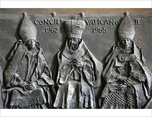 Sculpture of the Vatican II Council on the door of St. Peters Basilica, Vatican