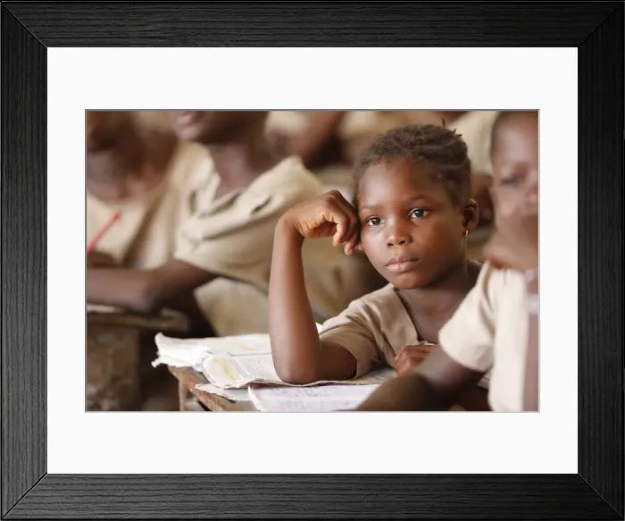 Framed Print : African primary school, young girl in the class room, Lome, Togo, West Africa, Africa Framed Print : African primary school, young girl in the class room, Lome, Togo, West Africa, Africa