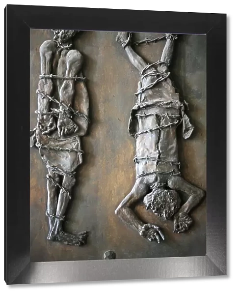 Sculpture of martyrs the door of St. Peters Basilica, Vatican, Rome, Lazio, Italy
