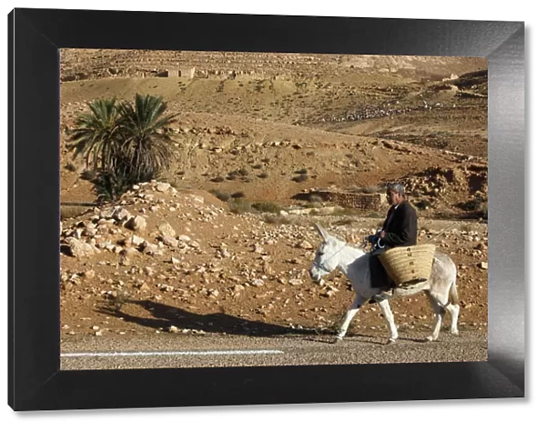 Man traveling on a donkey, Douirette, Tataouine, Tunisia, North Africa, Africa