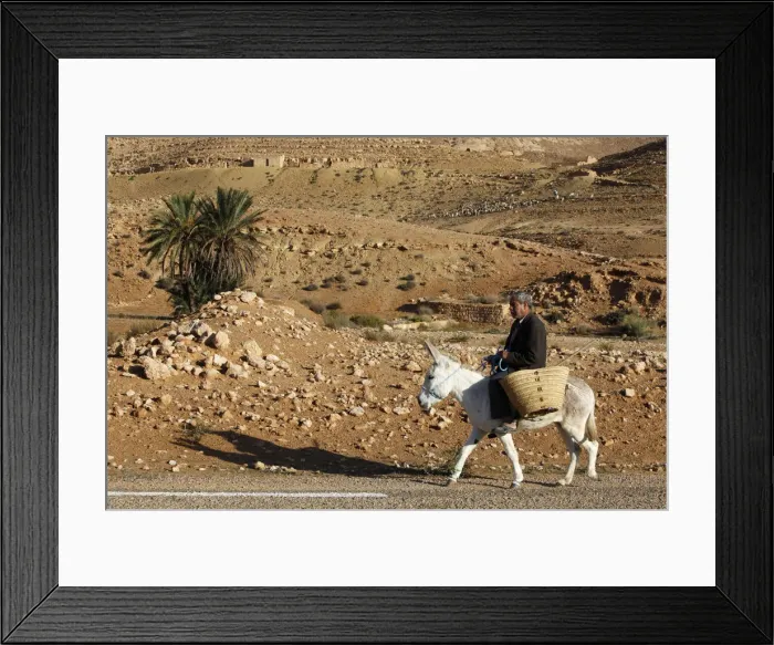 Framed Print : Man traveling on a donkey, Douirette, Tataouine, Tunisia, North Africa, Africa Framed Print : Man traveling on a donkey, Douirette, Tataouine, Tunisia, North Africa, Africa