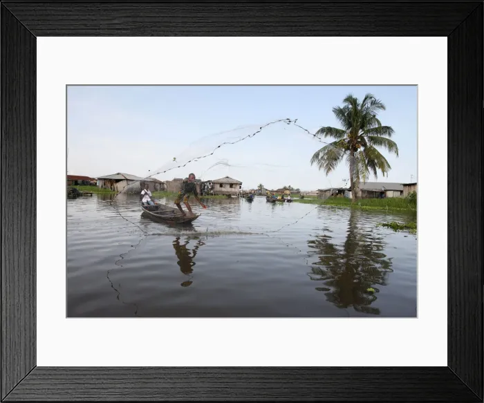Framed Print : Fishing in Ganvie lake village on Nokoue Lake, Benin, West Africa, Africa Framed Print : Fishing in Ganvie lake village on Nokoue Lake, Benin, West Africa, Africa