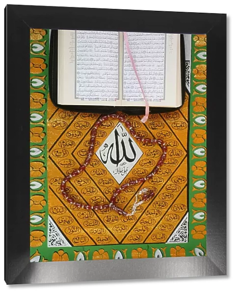 Koran, rosary and Allah calligraphy, Paris, France, Europe