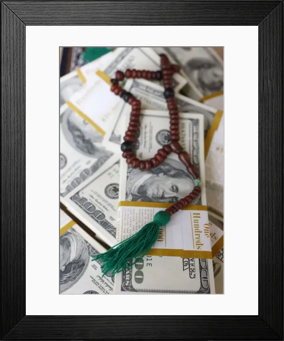 Framed Print : Muslim prayer beads and bank notes, France, Europe Framed Print : Muslim prayer beads and bank notes, France, Europe