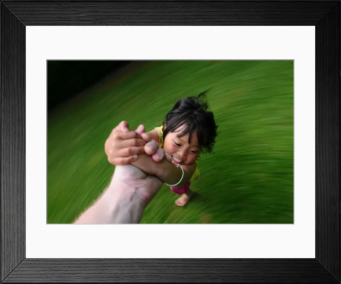 Framed Print : Child turning, Paris, France, Europe