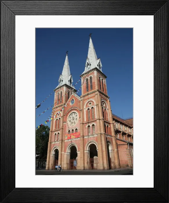 Framed Print : The Saigon Notre-Dame Basilica, a neo-Romanesque Catholic church built by the French in Framed Print : The Saigon Notre-Dame Basilica, a neo-Romanesque Catholic church built by the French in