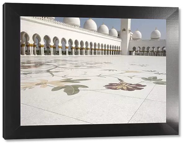 Colored floral marble and mosaics used as paving in the courtyard of 17, 000 square metres