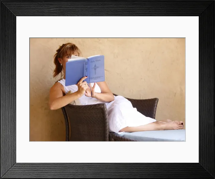 Framed Print : Woman reading the Bible, Abu Dhabi, United Arab Emirates, Middle East Framed Print : Woman reading the Bible, Abu Dhabi, United Arab Emirates, Middle East