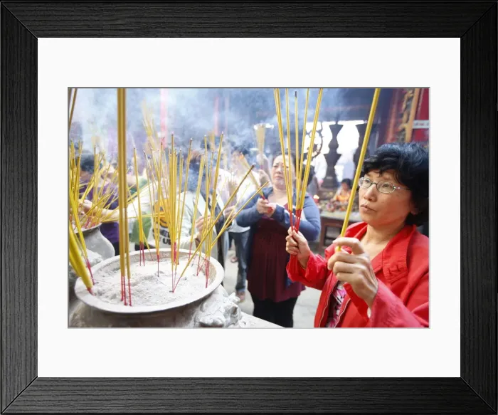 Framed Print : Burning incense during Tet, the Vietnamese lunar New Year celebration, Thien Hau Temple Framed Print : Burning incense during Tet, the Vietnamese lunar New Year celebration, Thien Hau Temple