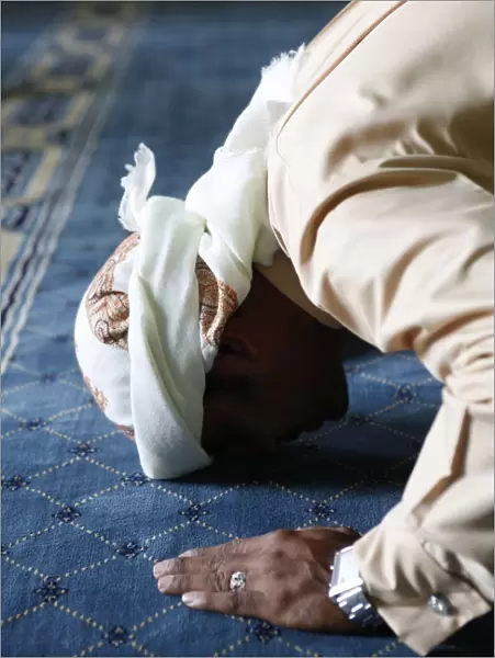 Muslim man praying, Dubai, United Arab Emirates, Middle East