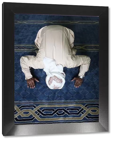 Muslim man praying, Dubai, United Arab Emirates, Middle East