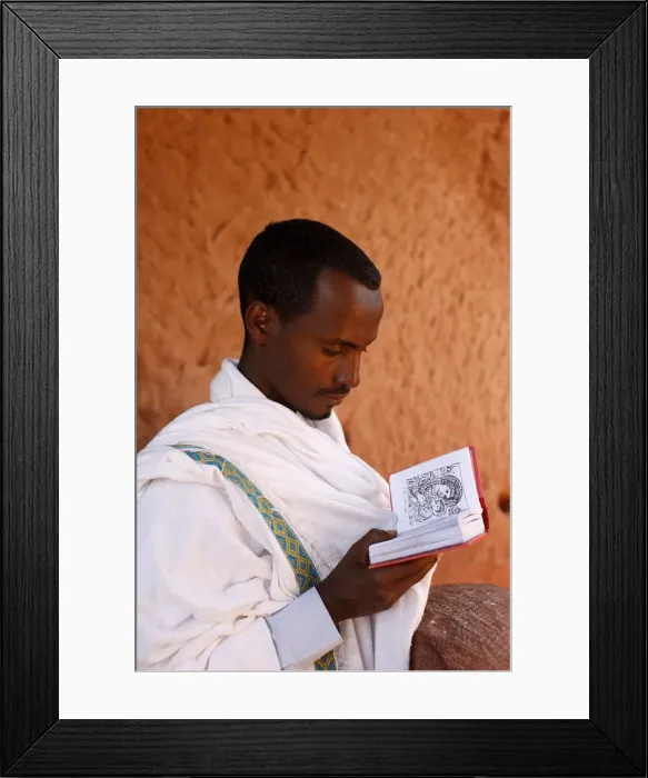 Framed Print : Faithful reading outside a church in Lalibela, Ethiopia, Africa Framed Print : Faithful reading outside a church in Lalibela, Ethiopia, Africa