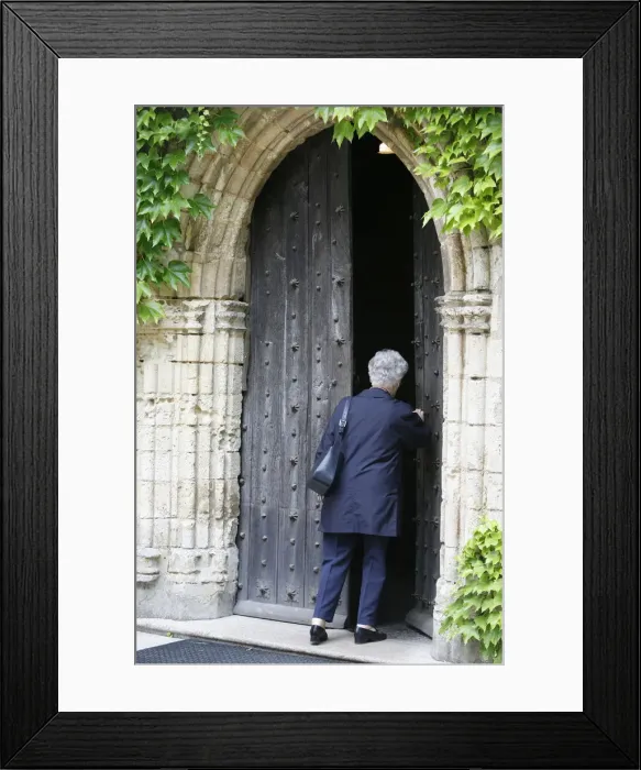 Framed Print : Woman walking into Saint-Pierre de Solesmes Abbey church, Solesmes, Sarthe Framed Print : Woman walking into Saint-Pierre de Solesmes Abbey church, Solesmes, Sarthe