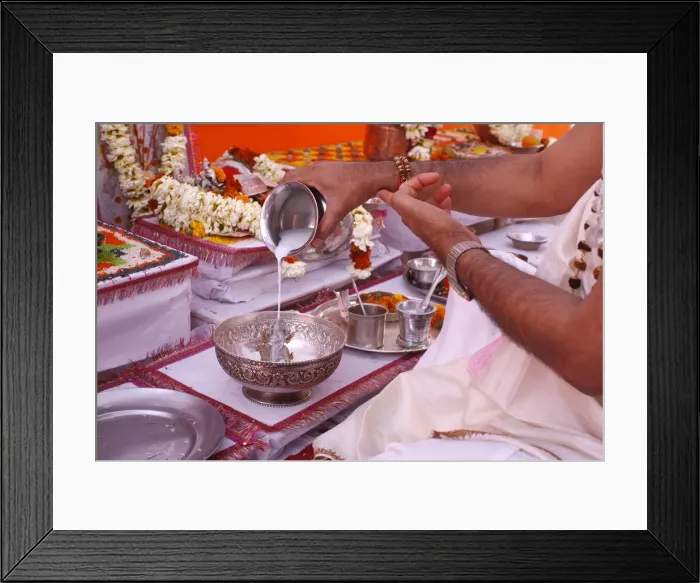 Framed Print : Bathing a statue of the goddess Durga with milk during Puja in a Hindu temple, Haridwar Framed Print : Bathing a statue of the goddess Durga with milk during Puja in a Hindu temple, Haridwar