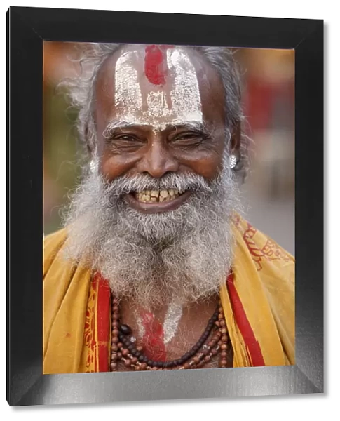 Smiling sadhu with Vishnu mark on his forehead, Rishikesh, Uttarakhand, India, Asia
