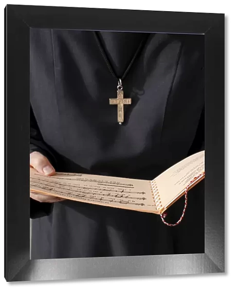 Catholic nun holding a music sheet, Annecy, Haute-Savoie, France, Europe